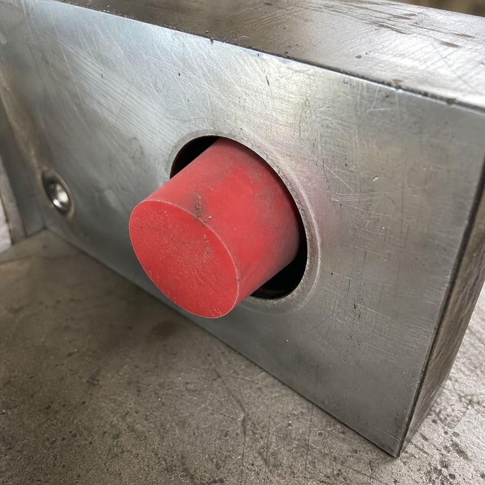 Loose fit silicone plug slipping out of a hole during industrial assembly process