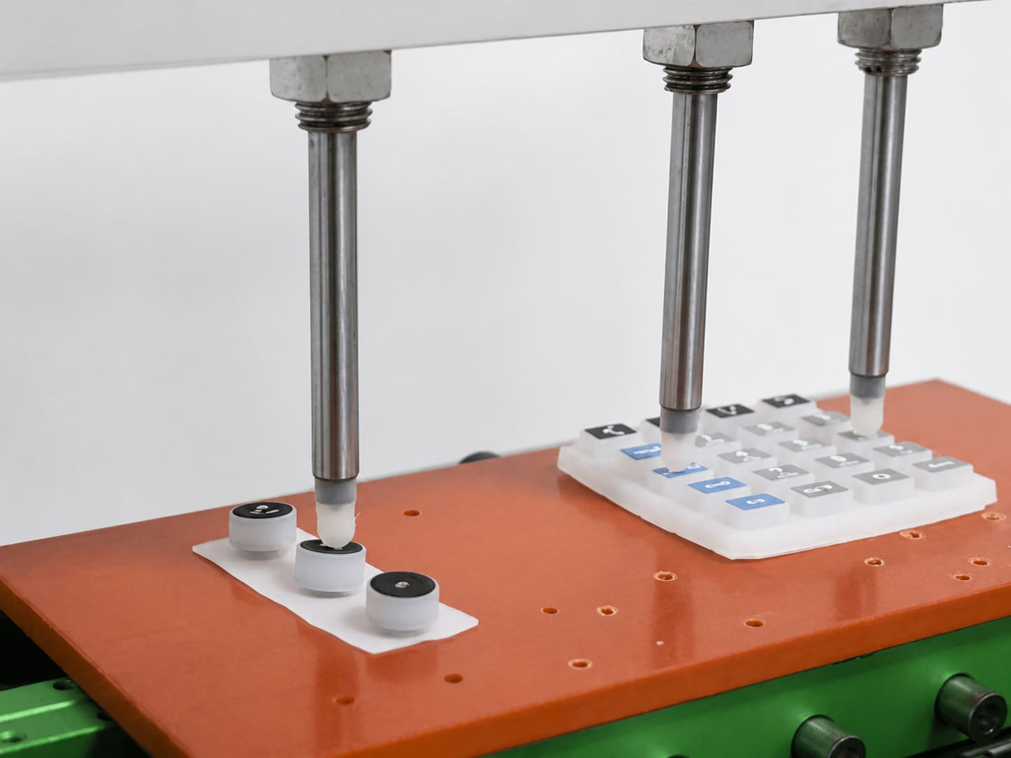 Silicone button tactile feel and actuation force engineering