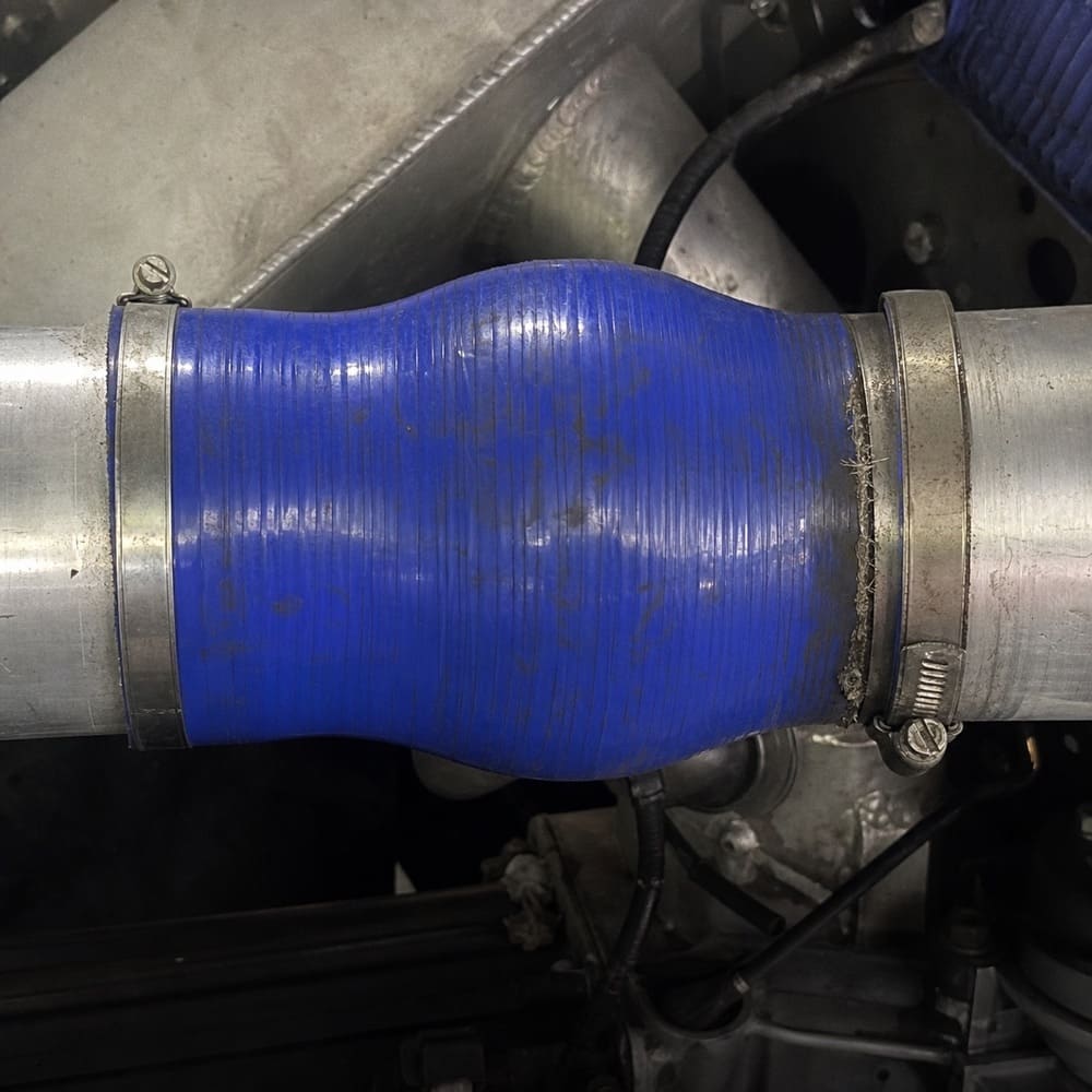 Silicone hose expanding under heat and pressure causing boost or flow loss