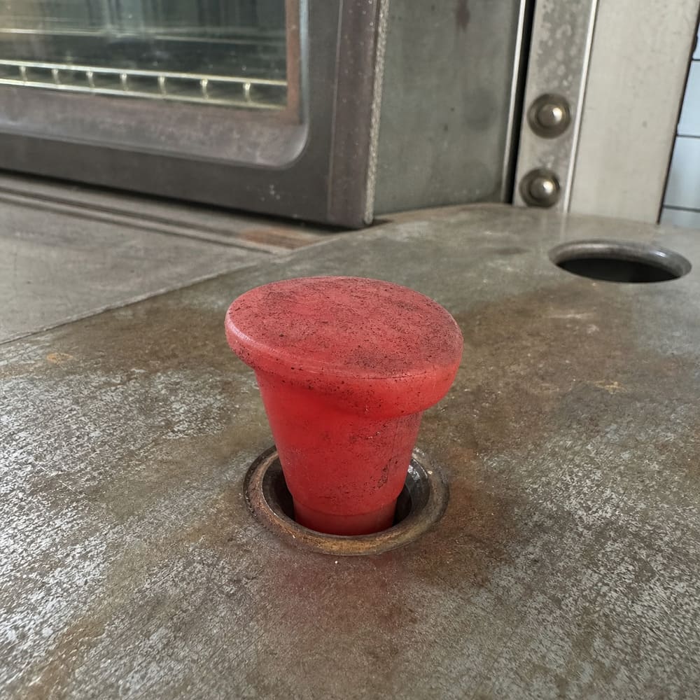 Silicone plug heat deformation caused by incorrect silicone grade in high-temperature industrial process
