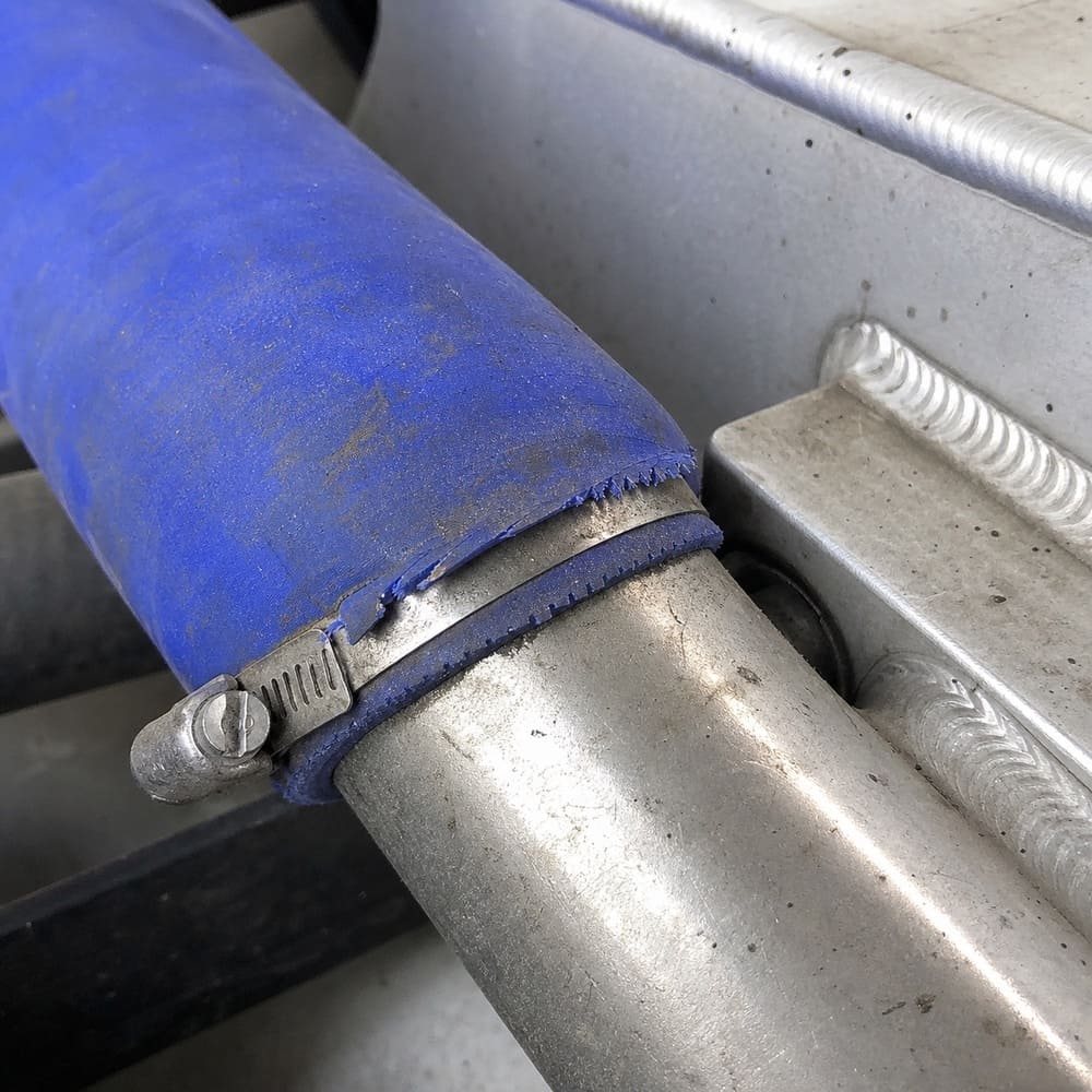 Silicone hose cut or blown off at clamp connections