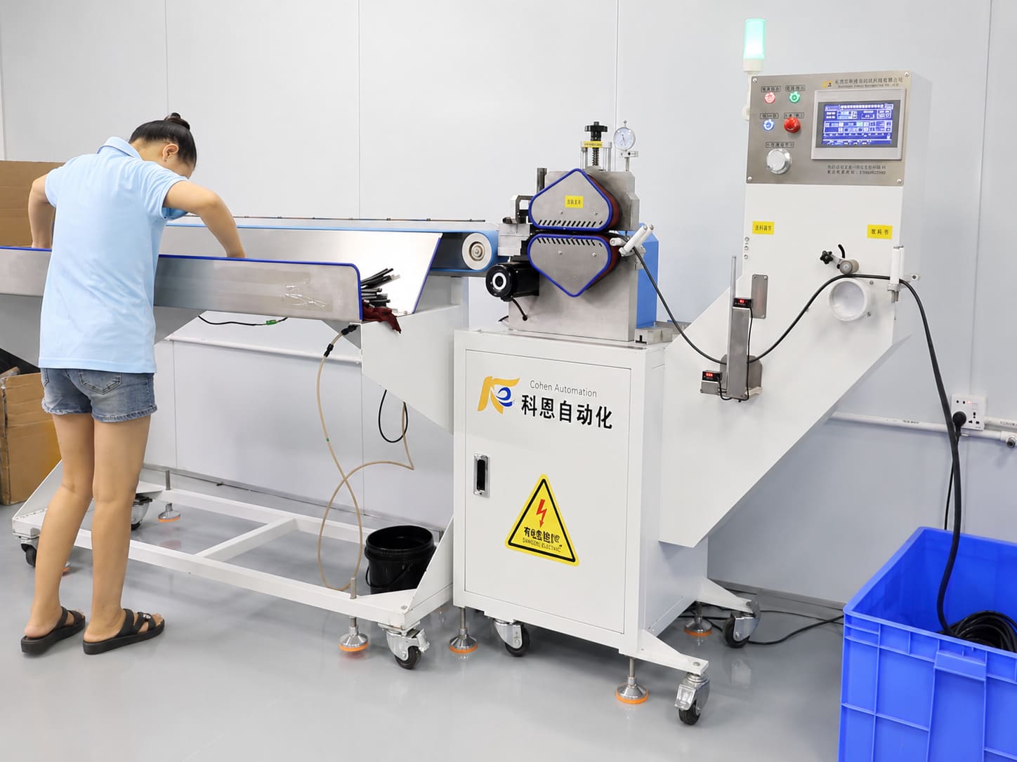 In-process quality control -- IPQC inspector measuring silicone parts on the production line